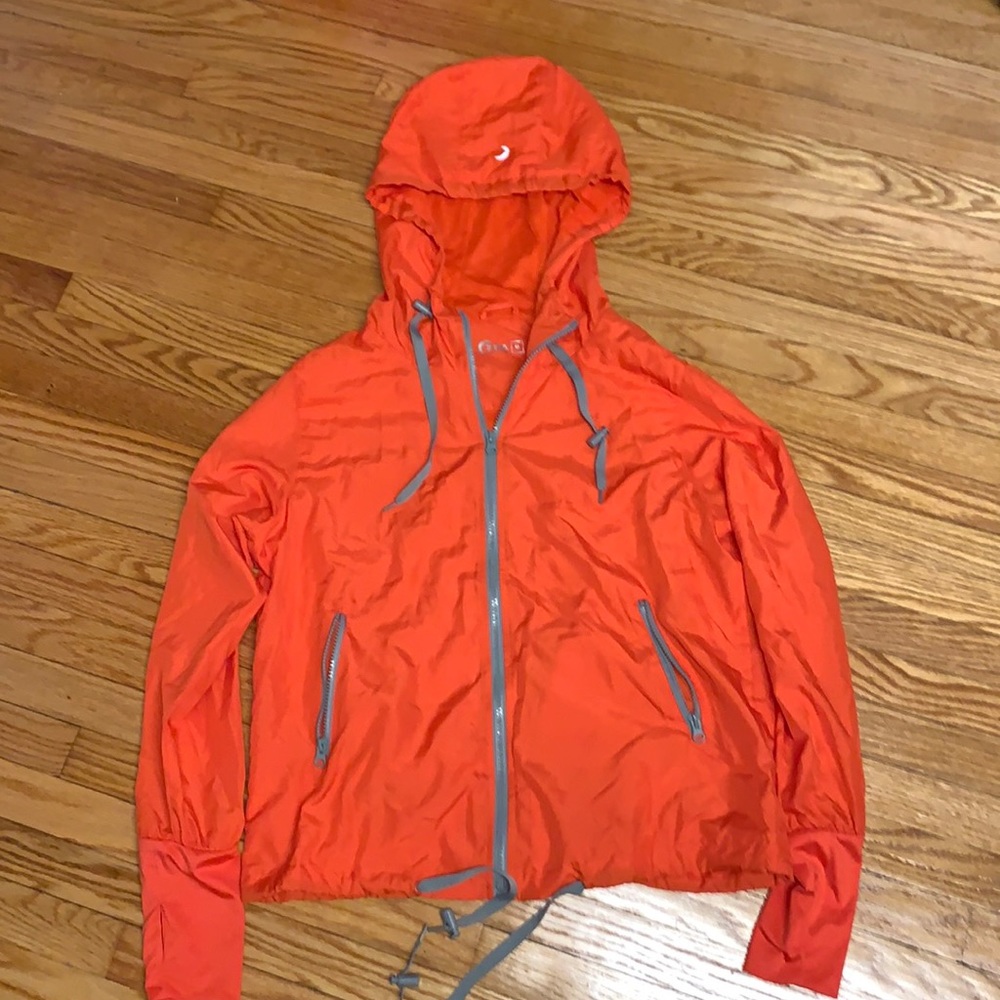 Zyia Active orange windbreaker